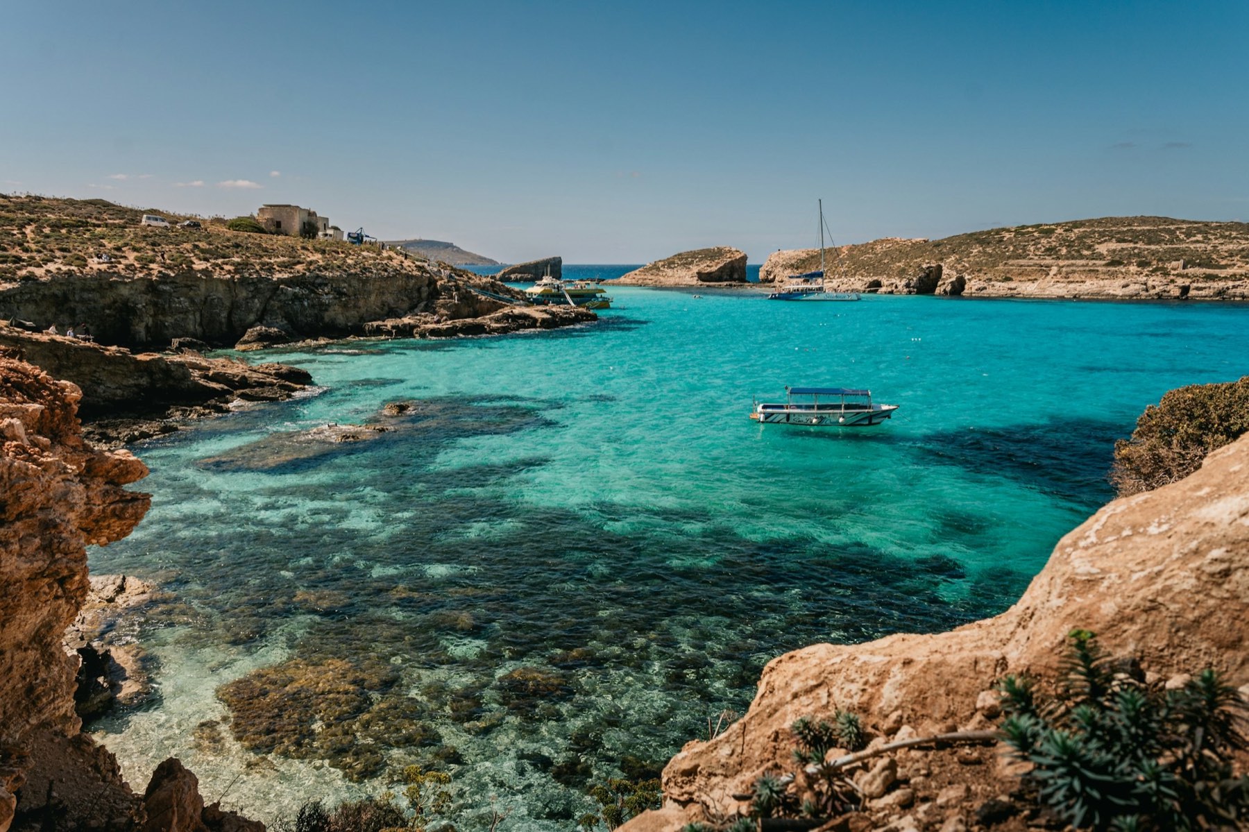 Clear water in a rocky bay, Malta